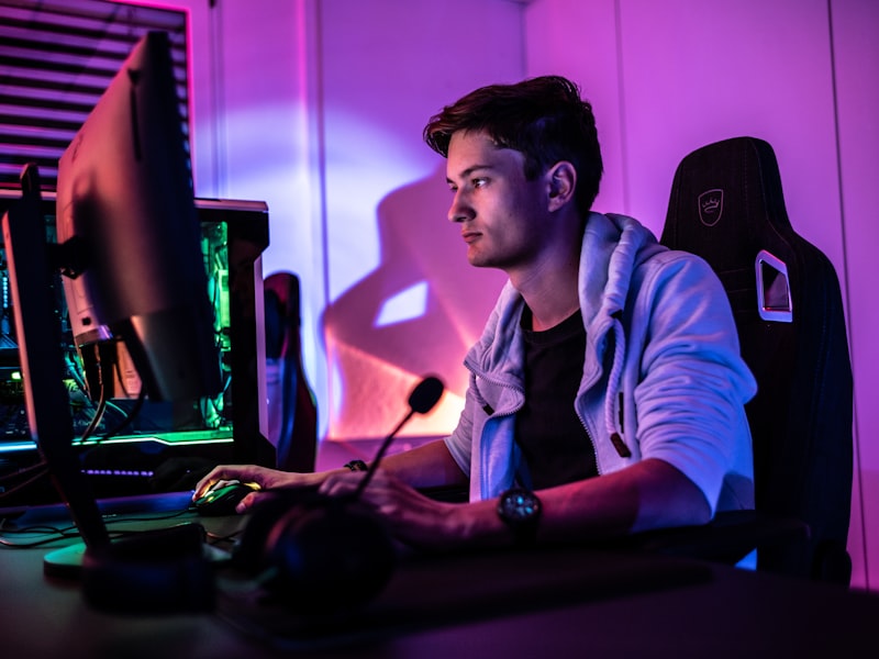 A coach reviewing gameplay with a player